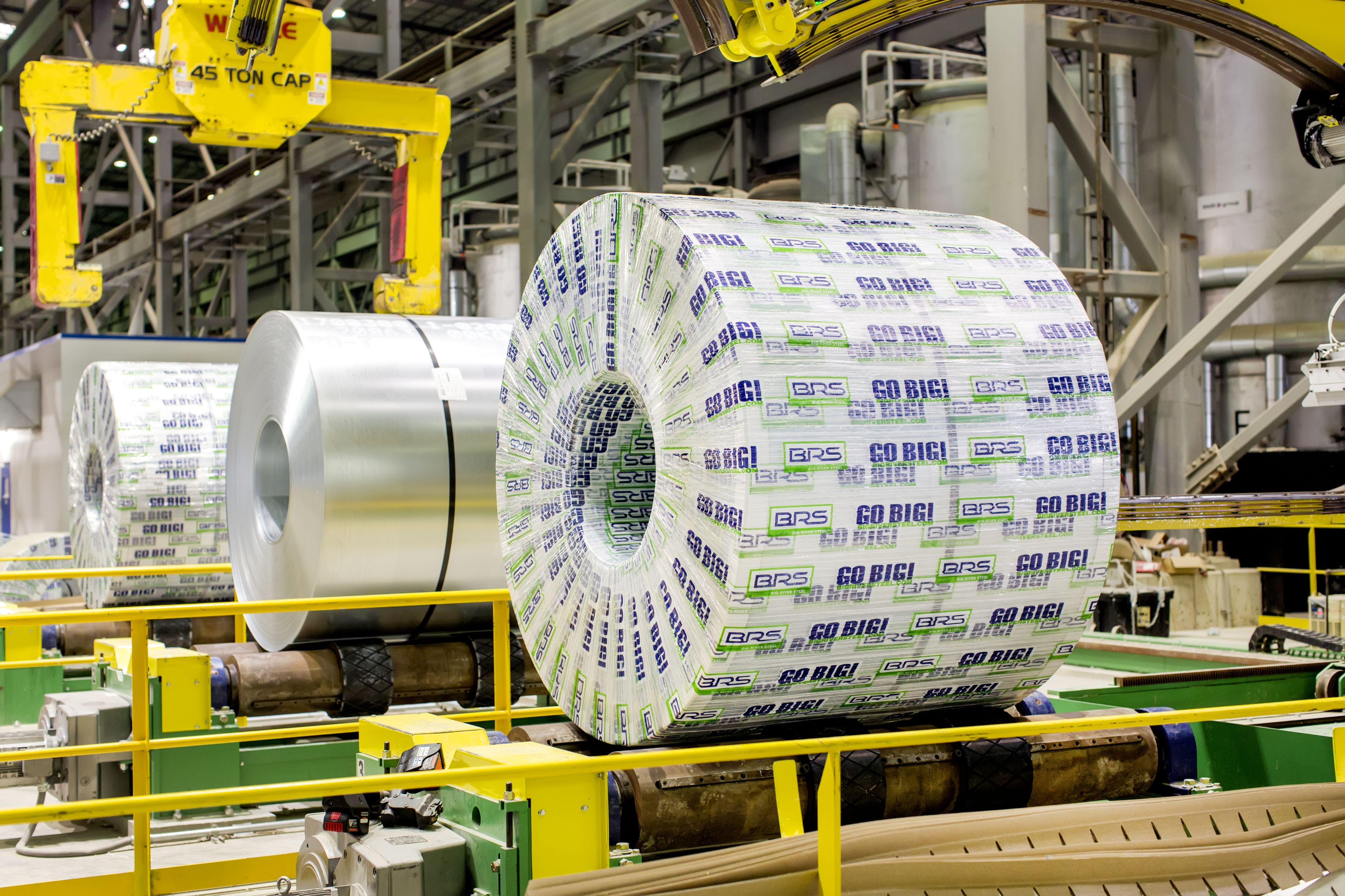 Wrapped and unwrapped steel coils at U. S. Steel's Big River Steel site.