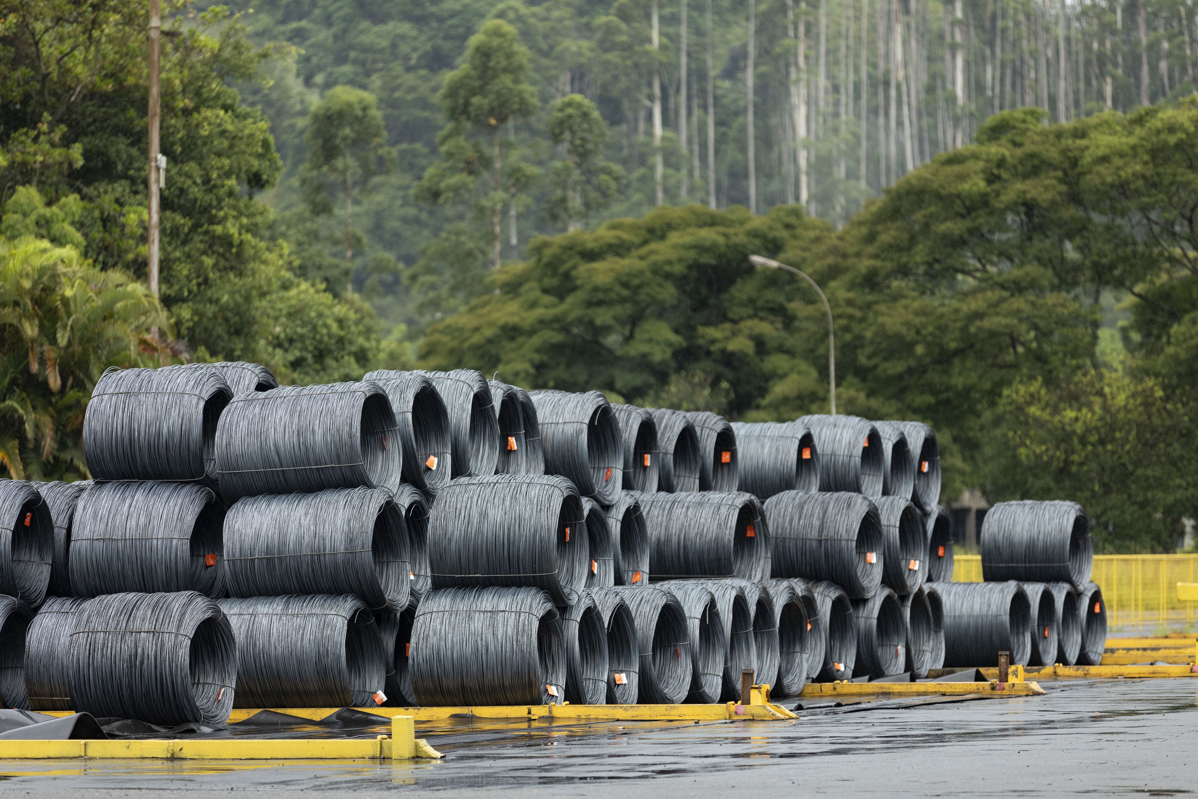 Piles of steel wire rod coils at an ArcelorMittal site in Brazil.